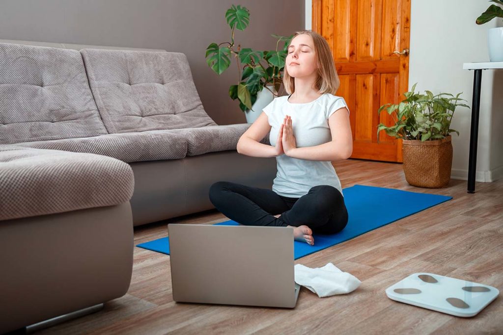 a teen practices meditation therapy